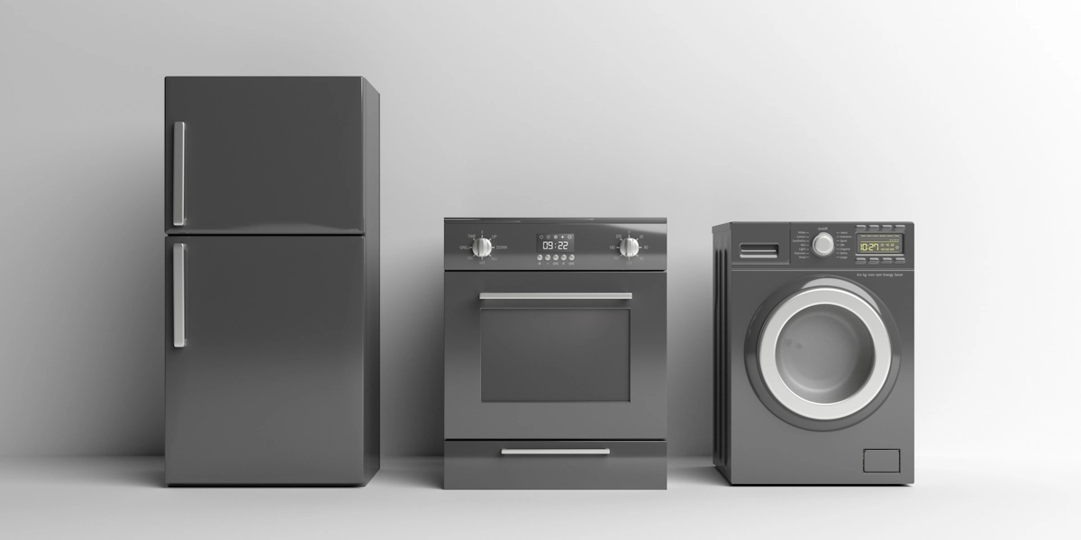 Un réfrigérateur, un four et un lave-linge